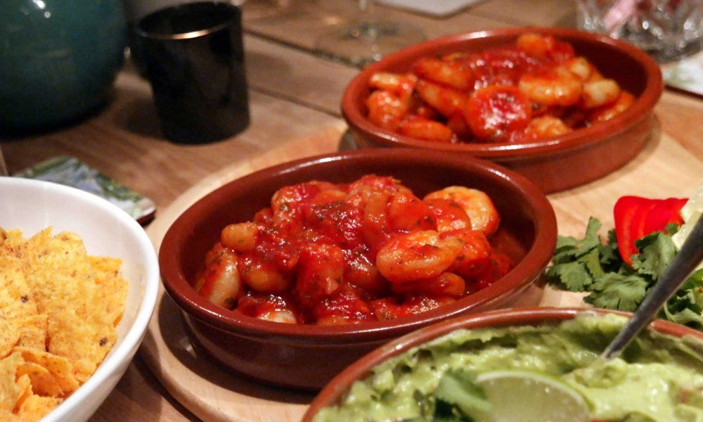 Snel en smaakvol gerechtje met sappige garnalen in een pittige tomatensaus