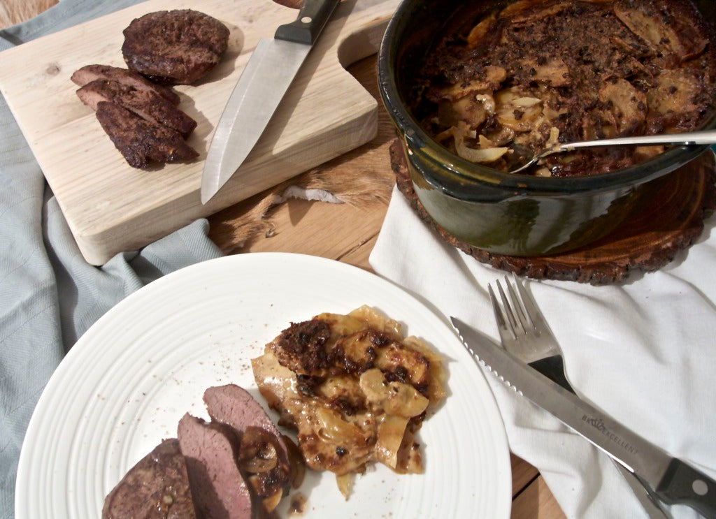 Sappig hertenbiefstuk met een romige aardappelgratin vol bospaddestoelensmaak